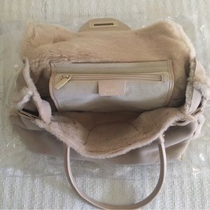 In new condition. Maybe used once but I doubt it.